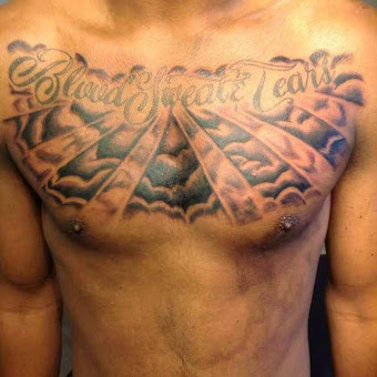 Blood Sweat & Tears Lettering With Clouds Tattoo On Man Chest