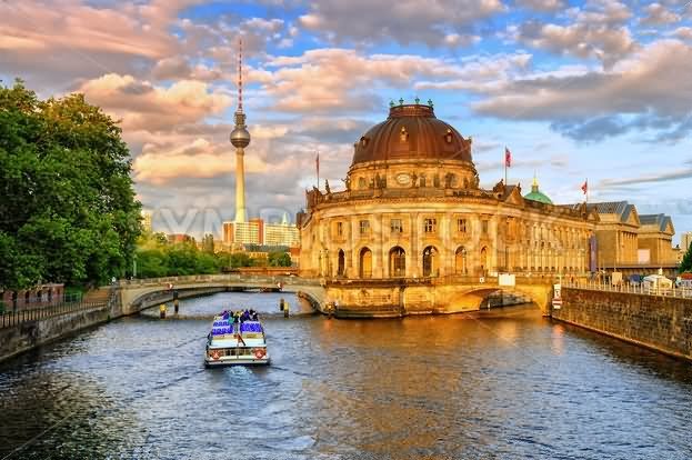 Bode Museum On Spree River And Fernsehturm Tower During Sunset In Berlin