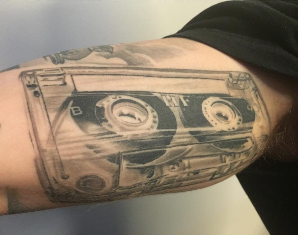 Cassette Tattoo On Bicep by Tattoo Mini