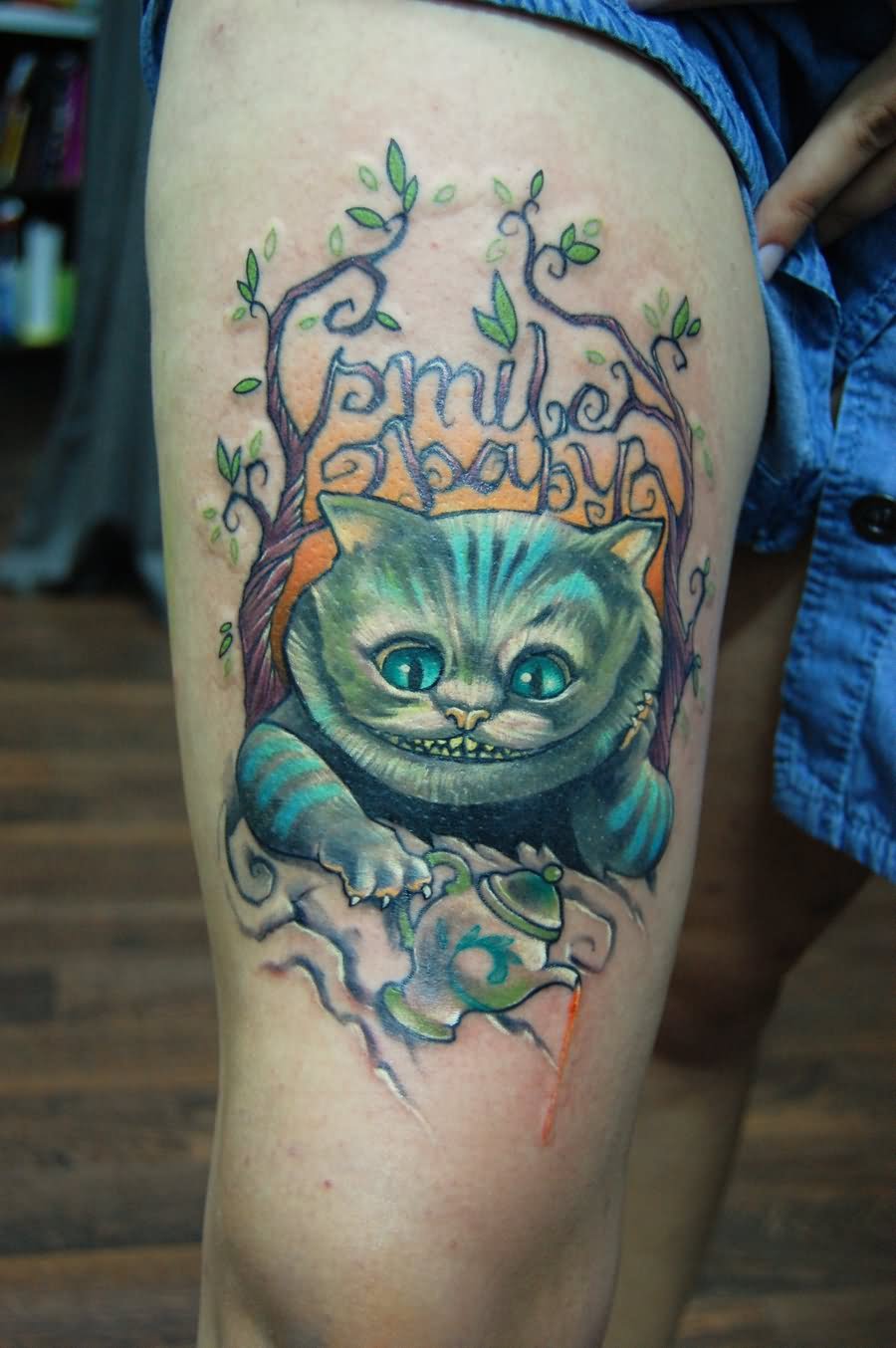 Cheshire Cat Tattoo On Right Thigh by Jukan6