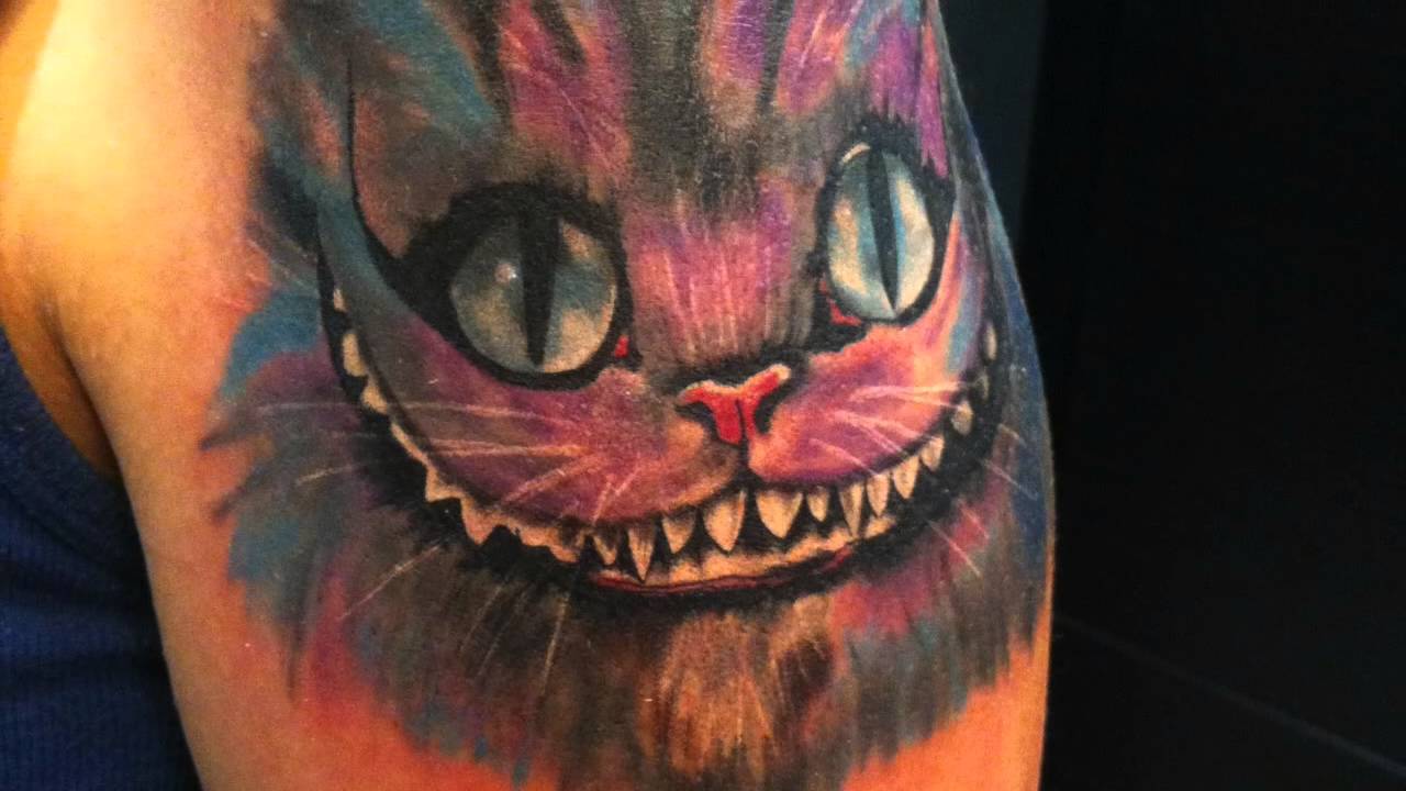 Cheshire Cat Tattoo On Shoulder by Junba Nadal
