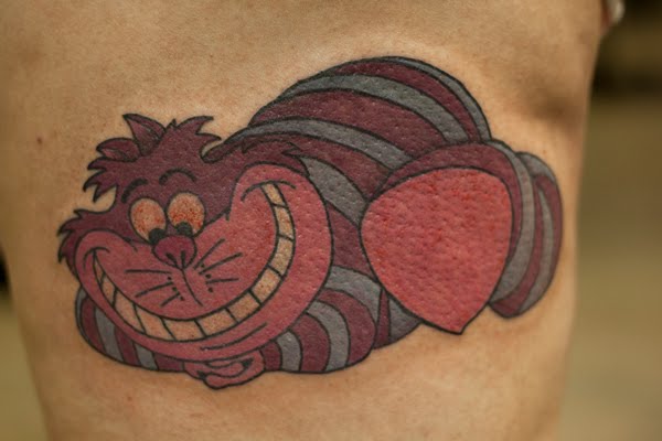 Cheshire Cat Tattoo On Side Rib