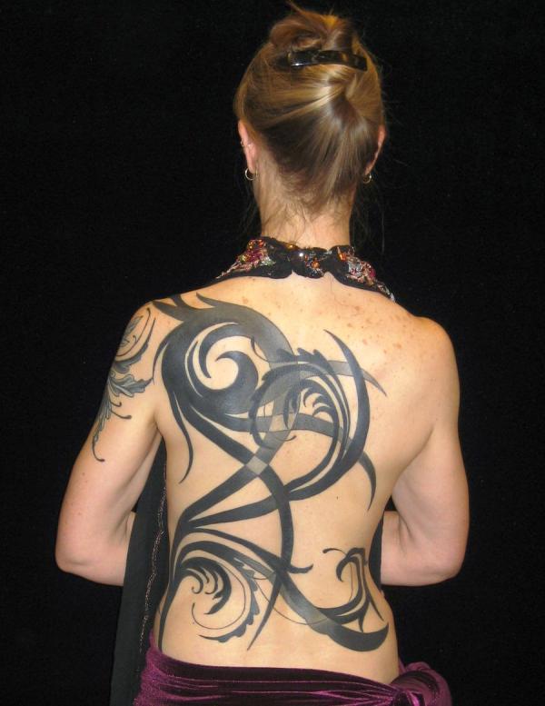 Classic Black Tribal Design Tattoo On Girl Full Back
