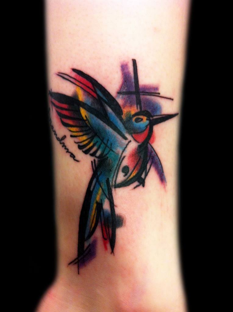 Classic Colorful Abstract Bird Tattoo Design For Forearm