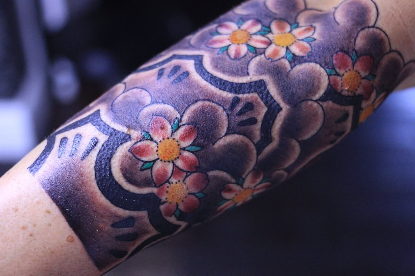 Classic Japanese Cloud With Flowers Tattoo Design For Sleeve.