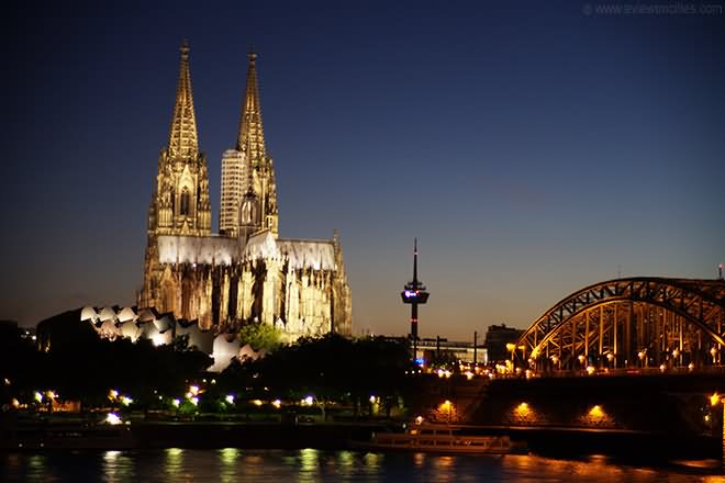 Cologne Cathedral And Hohenzollern Bridge At Night