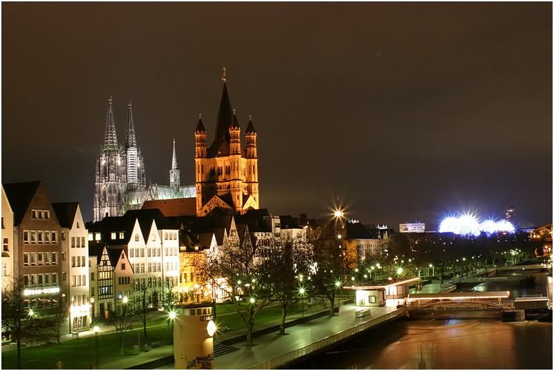Cologne Cathedral And St. Martin Church Illuminated In Cologne