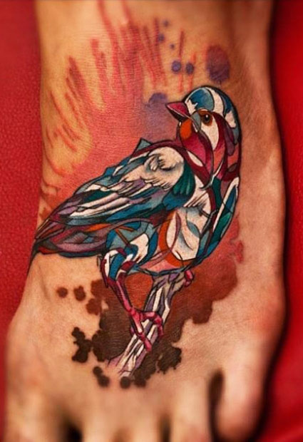 Colorful Abstract Bird Tattoo On Foot By Denis Sivak