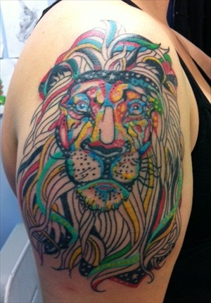 Colorful Abstract Lion Head Tattoo On Man Right Shoulder By Lacey
