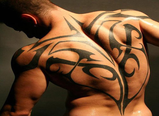 Cool Black Tribal Tattoo On Full Back
