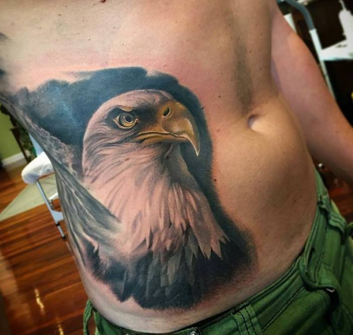 Eagle Head Tattoo On Man Side Rib