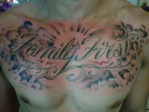 Family First - Black Ink Cloud With Sun Tattoo On Man Chest