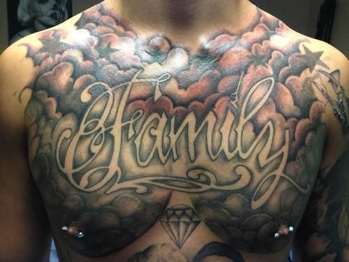 Family Lettering With Clouds Tattoo On Man Chest