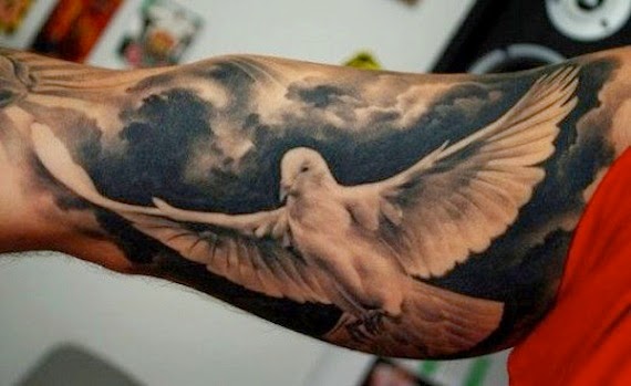 Flying Dove With Cloud Shading Tattoo Design For Bicep