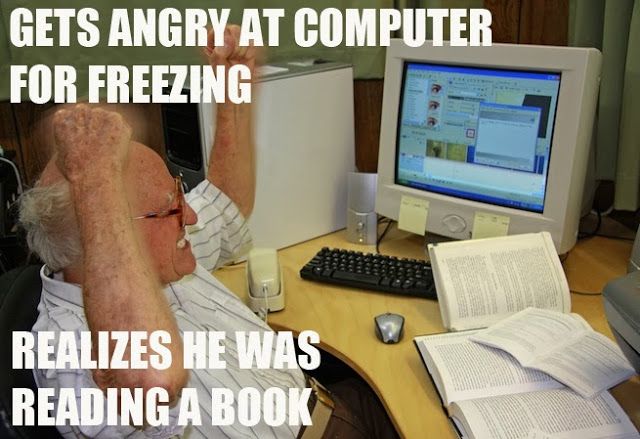 Funny Computer Meme Gets Angry At Computer For Freezing Realizes He Was Reading A Book Image