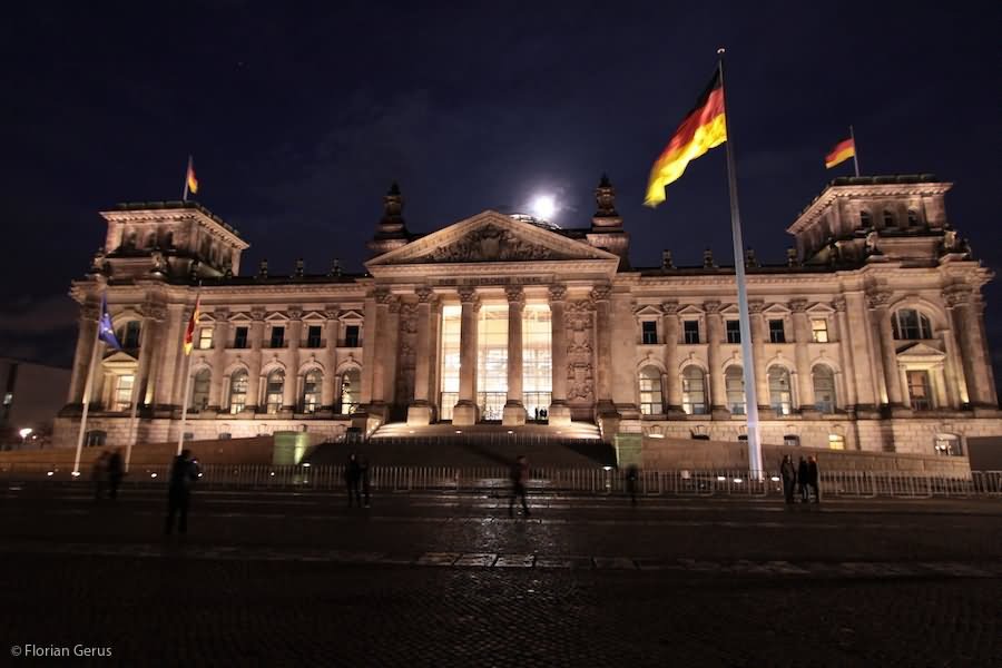 German Unity Flag In Front Of The Reichstag Building Night Picture