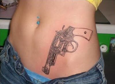 Girl Left Hip Revolver Tattoo