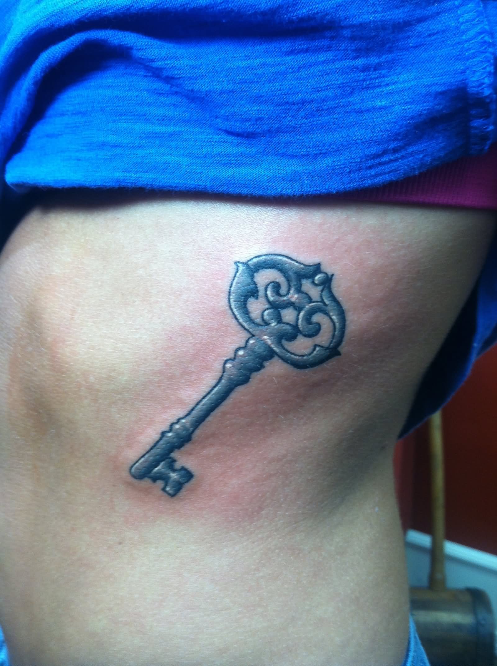 Girl Rib Side Skeleton Key Tattoo