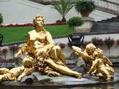 Golden Sculptures In Front Of The Linderhof Palace