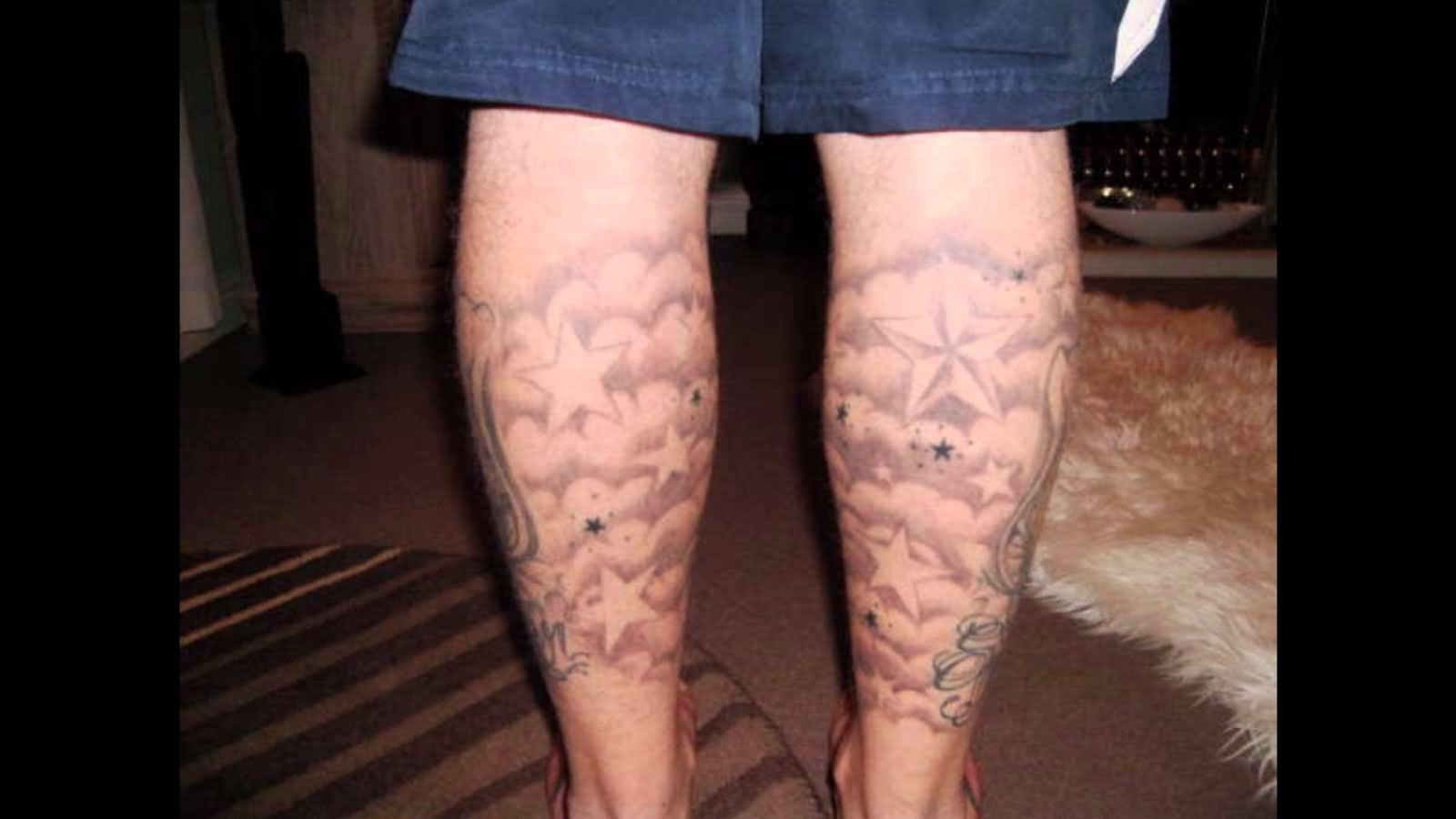 Grey Ink Clouds And Stars Tattoo On Both Leg Calf