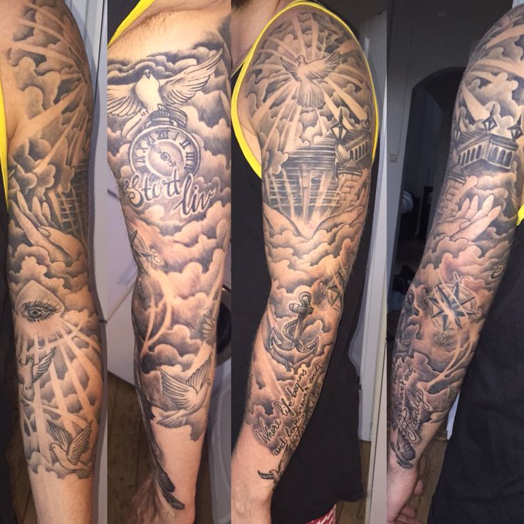 Grey Ink Clouds With Pocket Watch And Anchor Tattoo On Man Left Full Sleeve