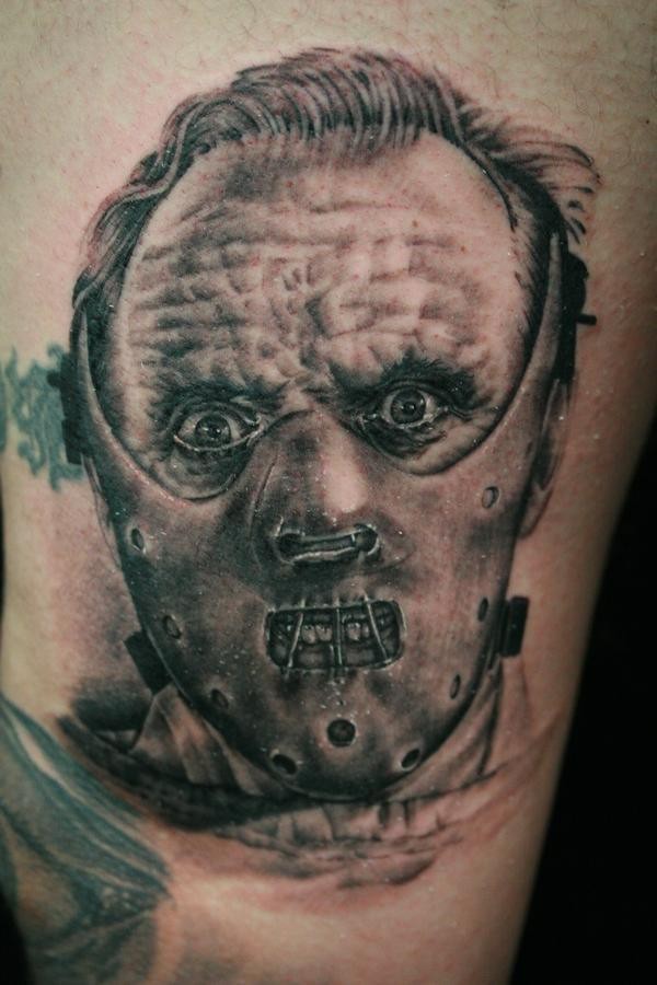 Grey Ink Horror Hannibal Lecter Tattoo Design