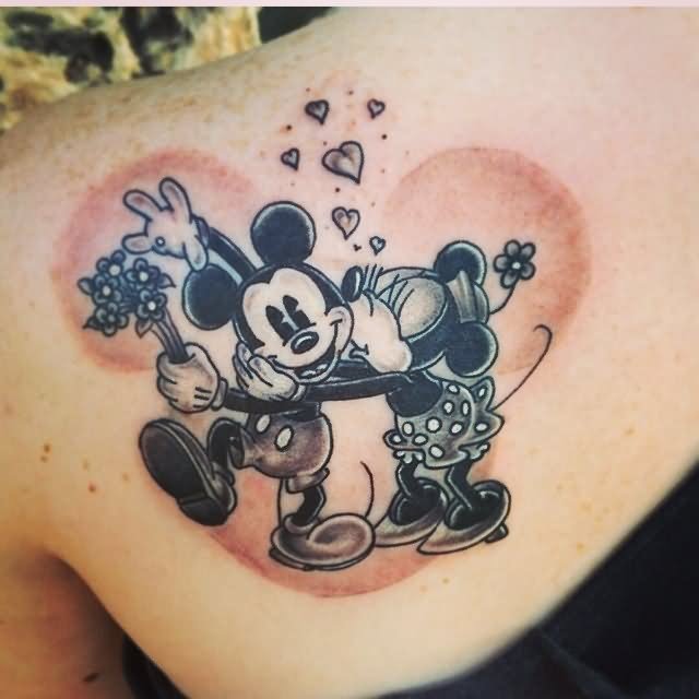 Grey Ink Minnie Kissing Mickey Mouse Tattoo On Left Back Shoulder