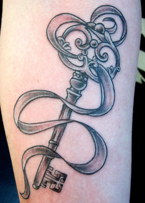 Grey Ink Ribbon And Skeleton Key Tattoo On Leg