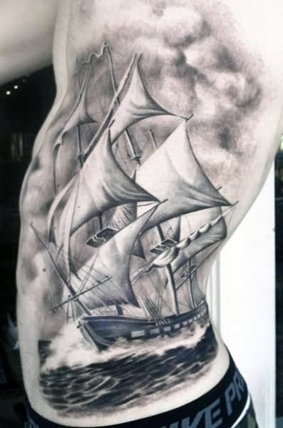 Grey Ink Ship With Shading Cloud Tattoo On Man Side Rib By Josh Duffy