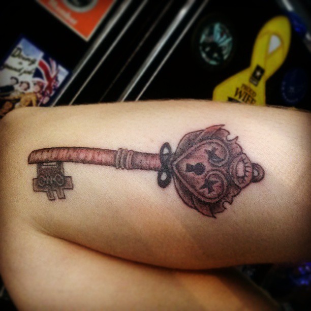 Grey Ink Skeleton Key Tattoo On Arm