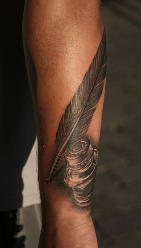 Ink Pot And Feather Tattoo On Arm by Nissen
