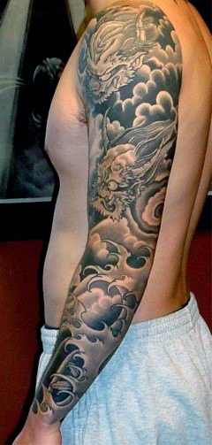 Japanese Clouds With Dragon Tattoo On Man Left Full Sleeve