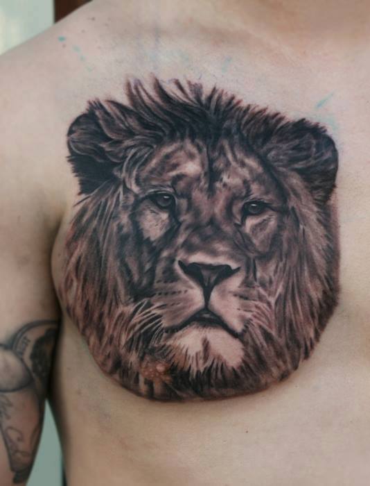 Lion Head Tattoo On Chest by Anders Grucz