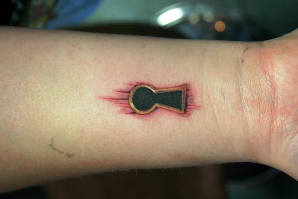Lock Key Tattoo On Left Wrist