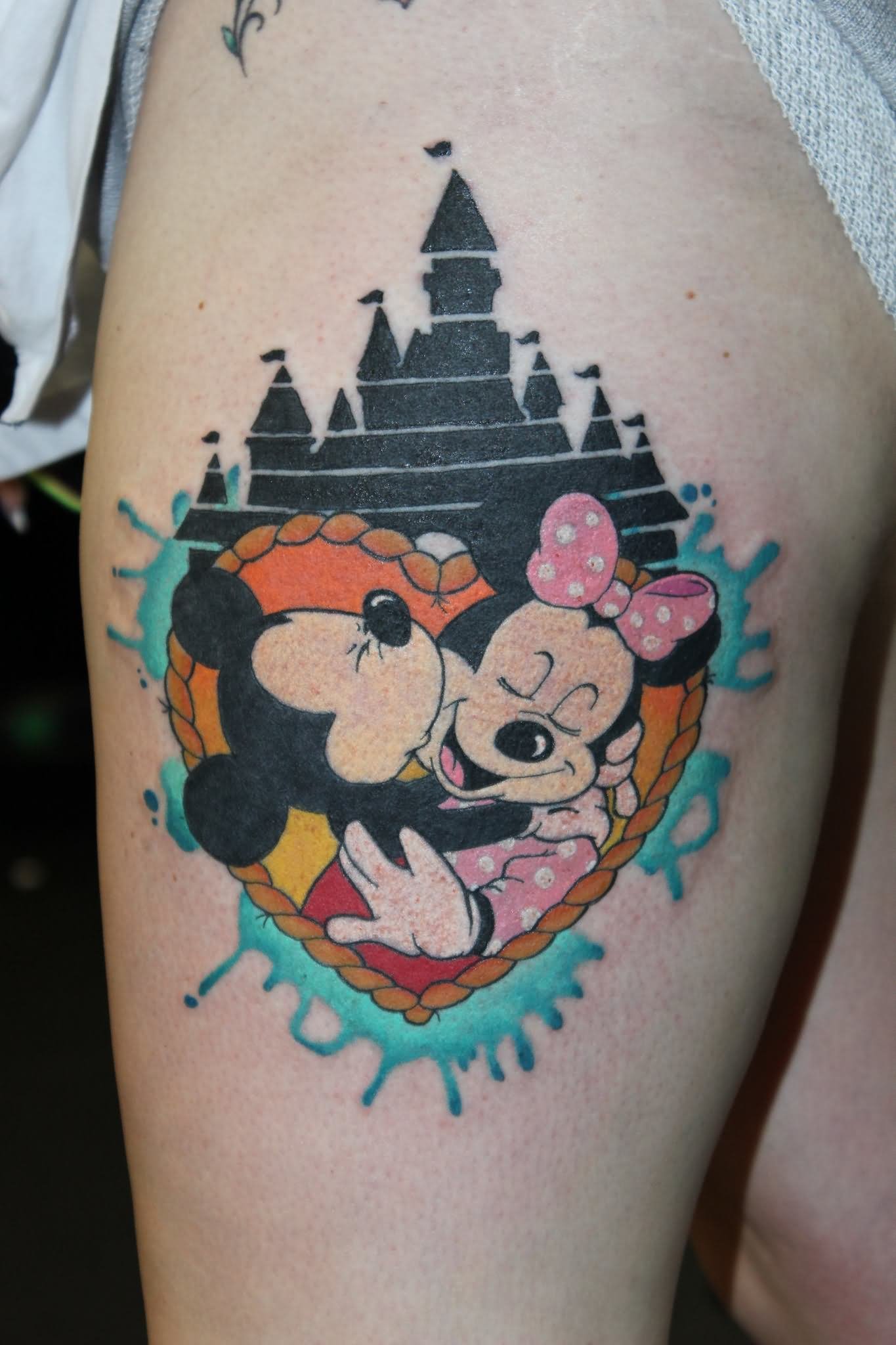Mickey Mouse And Minnie Mouse Tattoos On Left Thigh