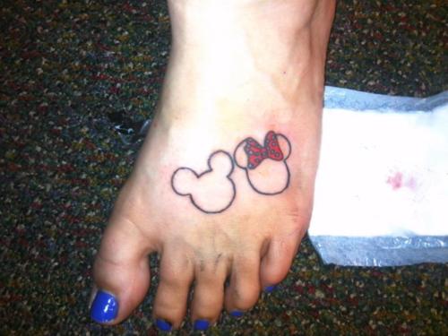 Minnie And Outline Mickey Mouse Tattoos On Left Foot