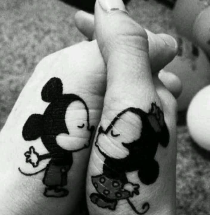 Minnie Mouse And Mickey Mouse Kissing Tattoos On Hands