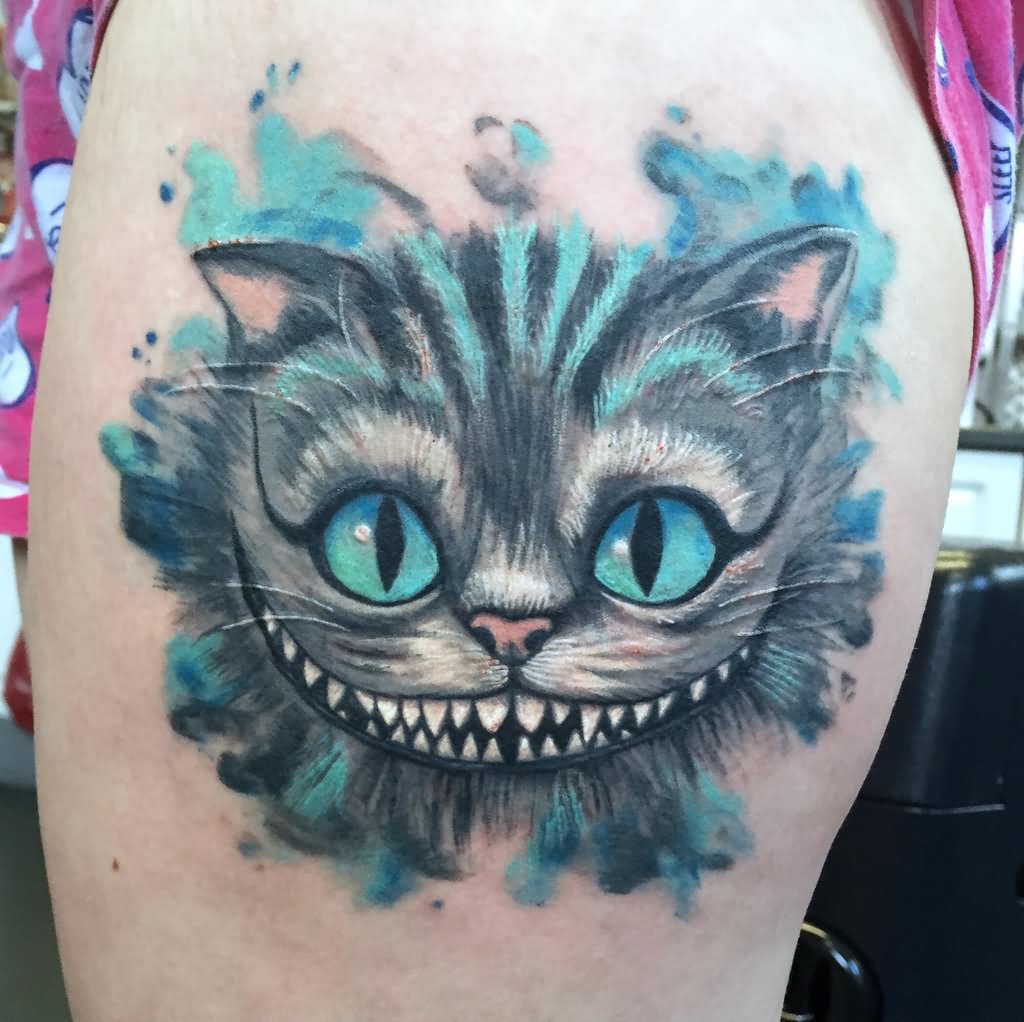 Nice Blue Ink Cheshire Cat Tattoo On Side Thigh