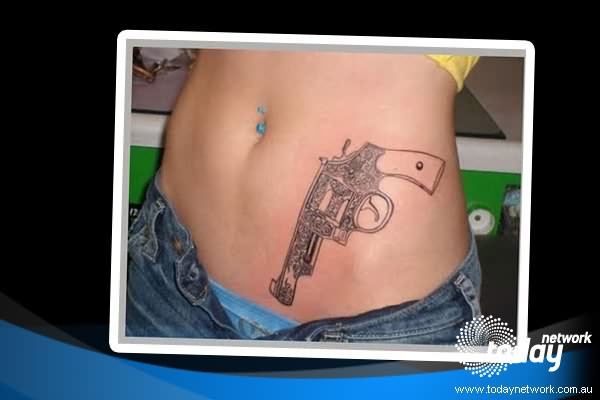Nice Revolver Tattoo For Girls
