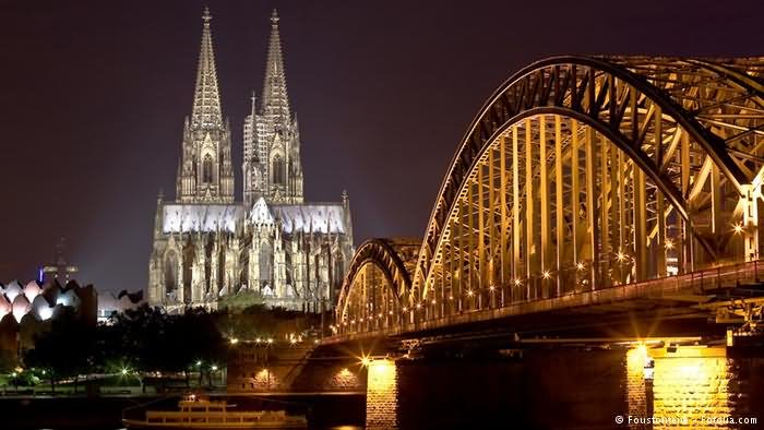 Night Shot Of The Cologne Cathedral And Hohenzollern Bridge