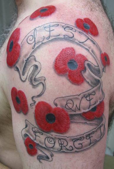 Poppy Flowers With Banner Tattoo On Left Shoulder