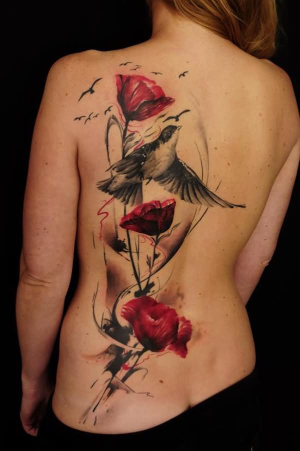 Poppy Flowers With Flying Bird Tattoo On Girl Back