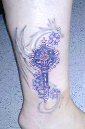 Purple Flowers And Skeleton Key Tattoo On Leg