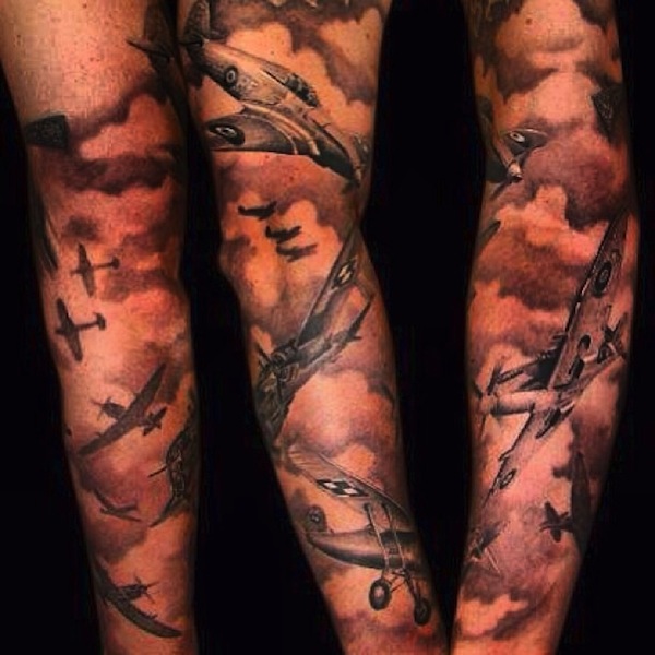 Realistic Fighter Plane With Clouds Tattoo On Right Full Sleeve