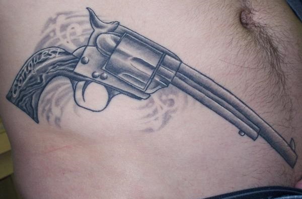 Realistic Grey Revolver Tattoo On Hip