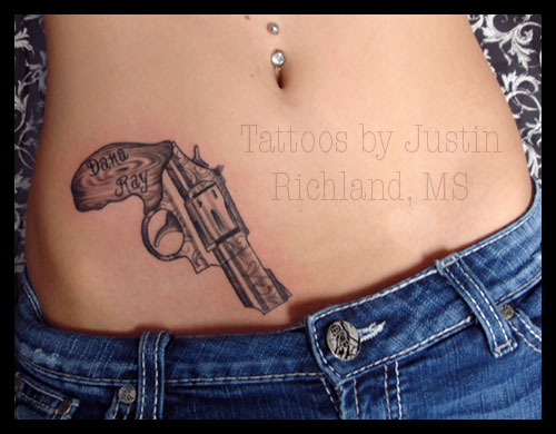 Revolver Tattoo On Right Hip