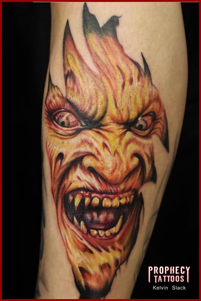 Ripped Skin Horror Zombie Face Tattoo Design For Leg Calf