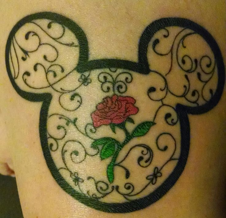 Rose In Mickey Mouse Tattoo On Shoulder