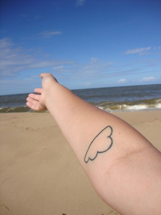 Simple Black Outline Cloud Tattoo On Right Forearm