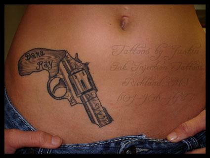 Simple Revolver Tattoo On Hip
